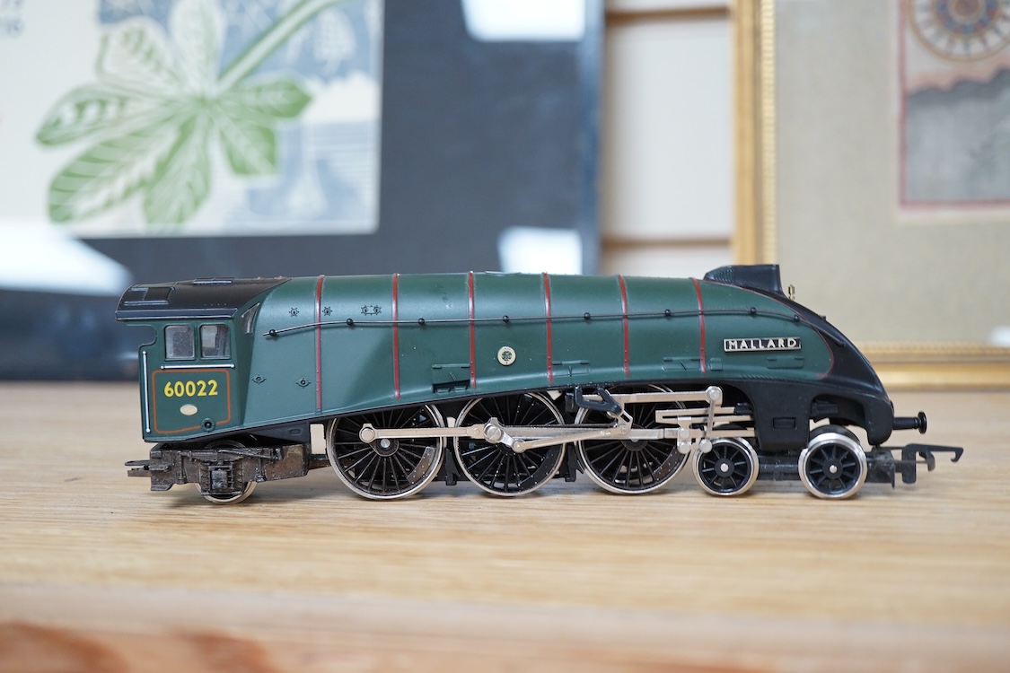 A quantity of 00 gauge model railway by Hornby, Tri-ang, etc. including nineteen locomotives in BR, GWR, LMS, etc. liveries, together with a boxed electrically operated turntable (R070), a terraced house (R8621) and a ga